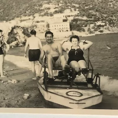 Found Black & White Photo Man Woman In Swimsuit Beach Pedal Boat Vtg • $9