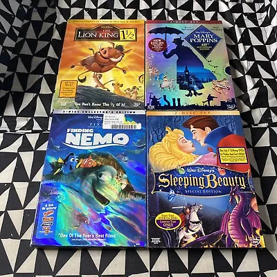 Disney DVD Lot 4 - Lion King 1 1/2 Nemo Marry Poppins Sleeping Beauty Slipcover • $15