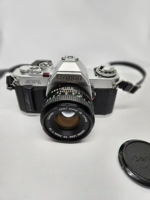 Canon AV-1 35mm SLR Camera With 50mm F/1.8 Lens - Near Mint • £160