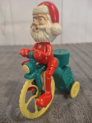 Vintage Christmas Collectible SANTA TRICYCLE Plastic Mechanical Wind Up Toy Bike • $16.99