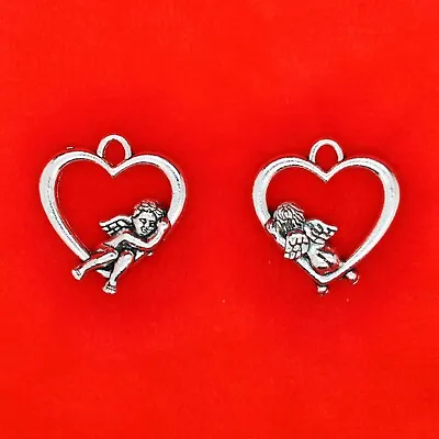 8 X Tibetan Silver 3D Cupid Sitting On A Love Heart Loveheart Valentine Charms  • £2.49