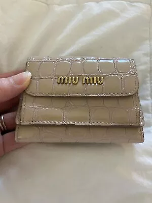 MIU MIU Logo Embossed Leather Compact Trifold Wallet • $61