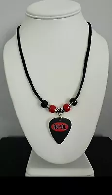 AC/DC Guitar Pick Necklace • £26.01