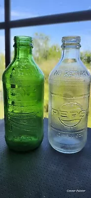 2 Vintage Pepsi-Cola & 7UP Embossed 10oz Soda Bottles • $18