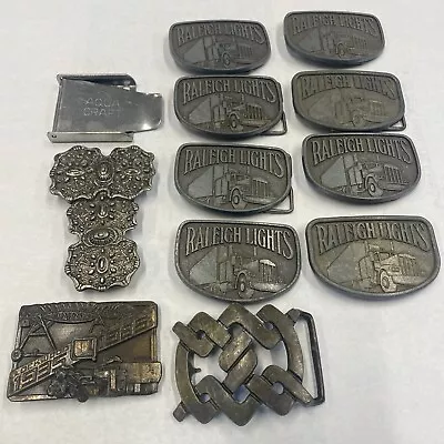 Lot Of 12 VINTAGE 1980'S RALEIGH LIGHTS CIGARETTES BELT BUCKLES WITH SEMI TRUCK • $29.95
