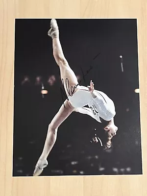 NADIA COMANECI HAND SIGNED 8x10 PHOTO OLYMPICS GYMNAST AUTOGRAPHED GOLD RARE COA • $49.99