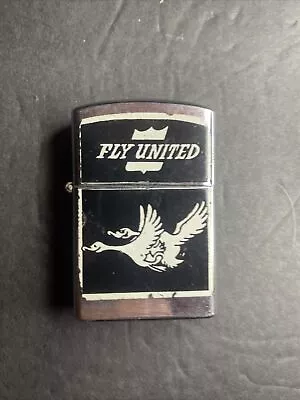 Vintage Fly United Airlines Penguin Lighter • $10