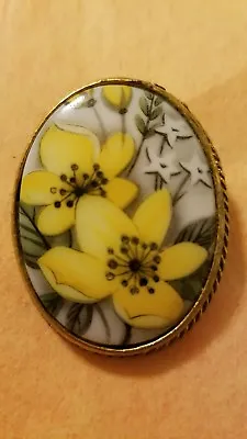 Vintage Gold Tone Hand Painted Porcelain Brooch In Rich Gray And Yellow Floral  • $12