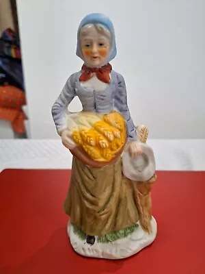 F3-Vintage Deville Ceramic Figurine Old Woman With Basket Of Wheat Multicolor • $9.99