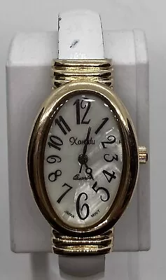 Ladies XANADU Watch W/fresh Battery Oval MOP Dial Stylized Numbers White Hinged • $9.90