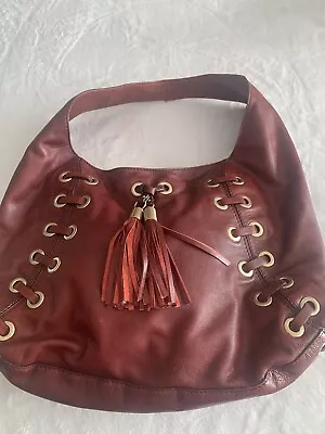 Michael Kors Leather Grommet Handbag Hobo Slouch Maroon Tassels Large • $60