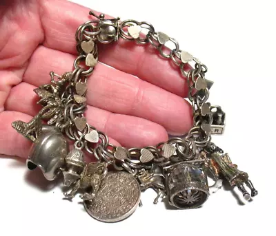 Sterling Silver Charm Bracelet Vintage 13 Charms Mixed Themes 49.4 Grams 7  • $225