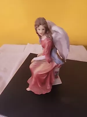 O'Well 9  Porcelain Angel Figurine Seated On Pedestal Red Dress White Wings  • $9.99