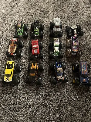 Lot 12 Hot Wheels Monster Jam Trucks Grave Digger Monster Mutt Predator Lot • $20