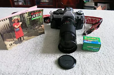 CANON AE-1 PROGRAM SLR 35mm FILM MANUAL CAMERA WITH FILM FOR SPARES OR REPAIRS • £25
