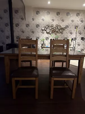 Solid Oak Extending Dining Table And Chairs • £250