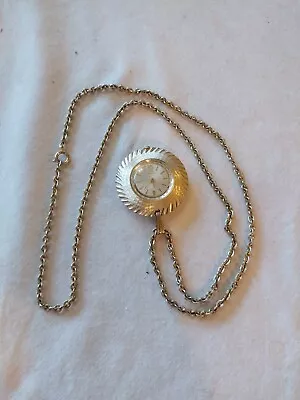 Vintage Timex Womens Disk Gold Tone Aluminum Pendant Wind Up Watch  • $5.99