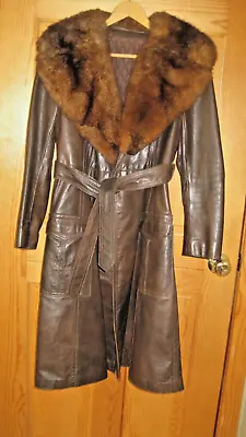 Womans Small / Med  Brown Leather Long  Winter Coat  W/ Racoon Collar  VINTAGE • $50