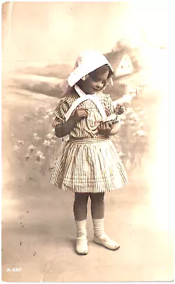 RPPC Little Girl In A Bonnet With A Doll Baby Message About Postcard Preference • $8.95