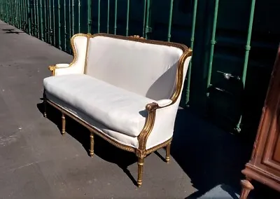 Gorgeous French Louis XVI Gilded Wingback Sofa With Decorative Serpentine Motif • $3000