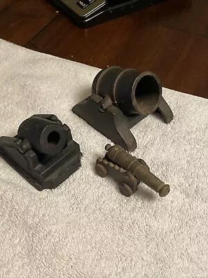 Vintage Lot Of 3 Cast Iron Cannons. 2 Miniature Mortar Cannon’s. 1 Brass Cannon • $60