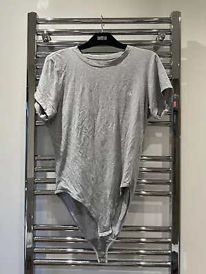 Calvin Klein Grey T-shirt Bodysuit • £15