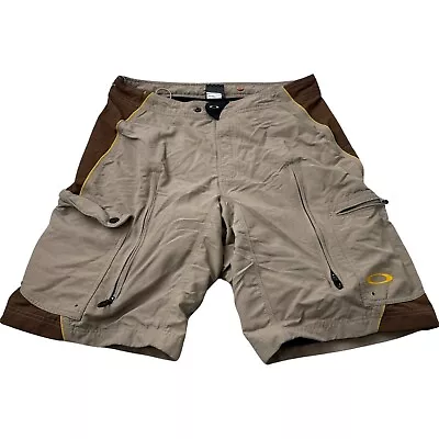 Vintage Oakley Shorts Mens XL Brown Ventilated Mountian Cargo Padded Bike 36x11 • $50