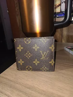 Louis Vuitton Mens Monogram Bifold Wallet • $260