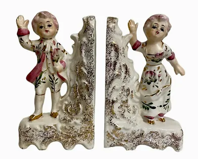 Vintage Bookends Japan  Porcelain Colonial Man Woman Figurine White Multicolor • £17.34