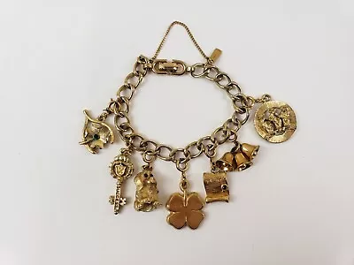 Vintage Monet 7  Gold Tone Charm Bracelet Double Link (7) Charms  Dog Bells Luck • $45