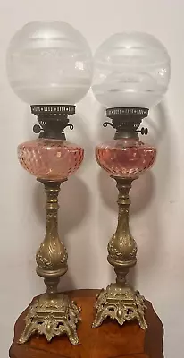 A Pair Of 19th Century Brass Oil Lamps Each With A Coloured Glass Well And Etch • £1