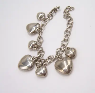 Vintage Silver Tone Puffy Heart Charm Bracelet 7 Hearts 8 1/2” • $15