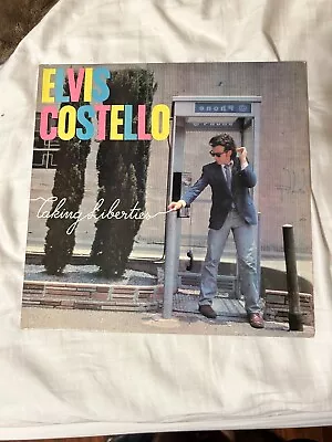 Elvis Costello- Taking Liberties Vinyl In VG  Condition • $8.32