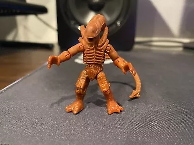 Mega Bloks Construx Heroes Xenomorph Warrior Alien Orange Mini Action Figure • $12.99