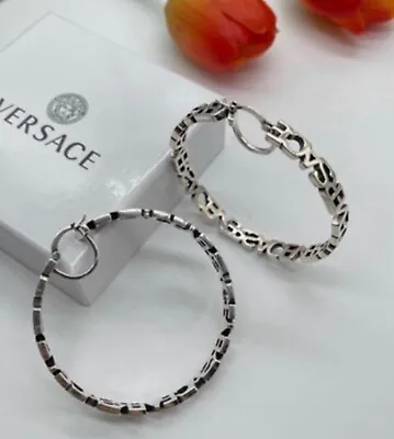 Versace Silver Tone Logo Hoop Earrings • $125