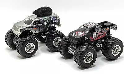 Lot Of 2 Hot Wheels Monster Trucks Mohawk Warrior & Metal Mulisha 1/64 Scale • $13.99