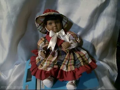 10  African American Musical Porcelain Doll • $11.20