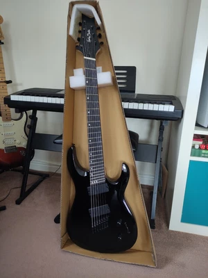£135 • Buy Harley Benton Black 457BK 7 String Fanfret Guitar