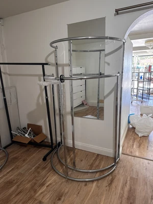 $80 • Buy 4 Curved Clothing Racks. Adjustable Height.