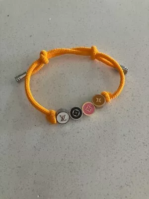 $48.82 • Buy Louis Vuitton Orange Friendship Charm Cord Bracelet