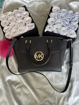 Michael Kors • $50