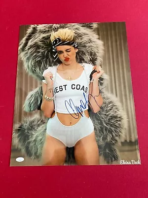 Miley Cyrus  Autographed  (JSA)  Full Signature  16x20 Photo (Scarce / Vintage) • $450