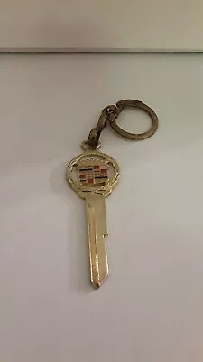 Vintage Cadillac Uncut Key/Keychain Gold Color • $17.99