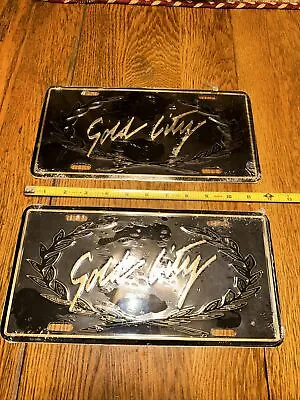 (2)  Vintage Metal  “GOLD CITY“  License Plates  Accessory Novelty Booster (NOS) • $300