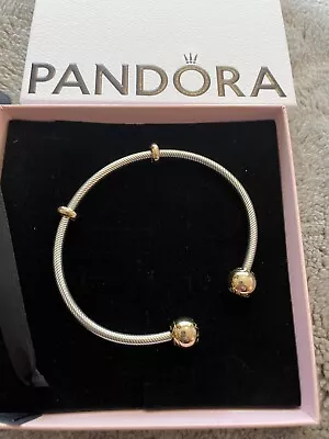 Genuine Pandora Open Bangle With Gold Coloured End Caps.  • £40