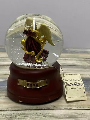 Musical Snow Globe With An Angel Holding A Dove-2006 Used • $10