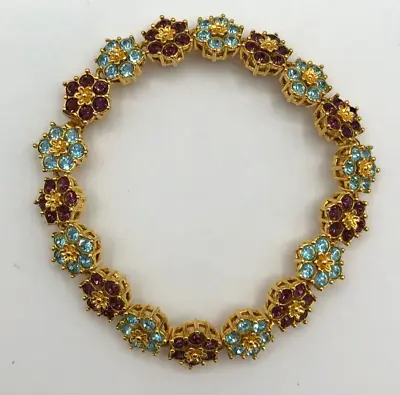 Vintage Nolan Miller Bracelet Gold Tone Blue & Purple Rhinestone Flowers • $42.23