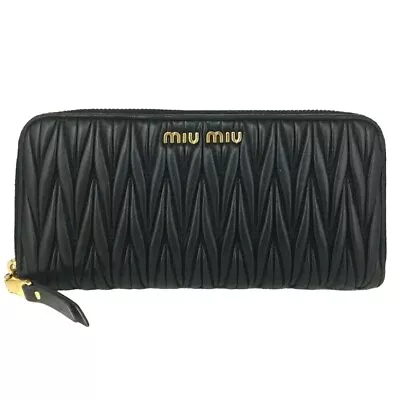 MIU MIU: Black Matelasse Leather & Logo Zip Wallet #1323 • $350