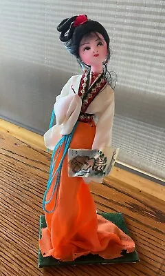 Vintage Chinese Doll With Orange Skirt And Holding Painting 11” Tall Black Base • $12.99