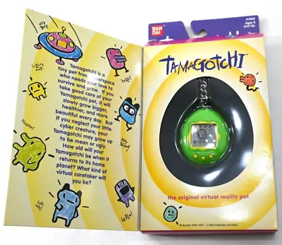 NEW OPEN BOX Vintage Tamagotchi Bandai 1997 Virtual Pet Toy Green Yellow #1800 • $55